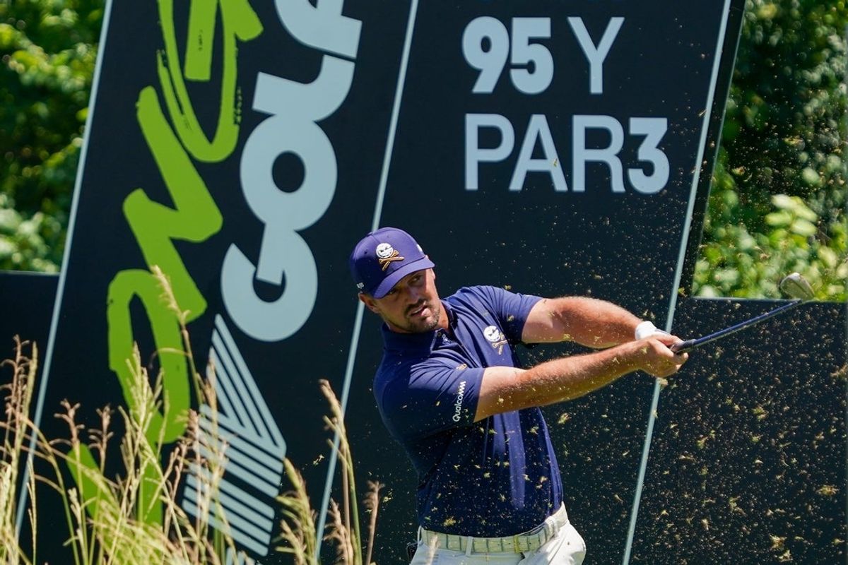Jun 29, 2025; Carrollton, Texas, USA; Bryson DeChambeau plays his shot from the eighth tee during the final round of the LIV Golf Dallas golf tournament at Maridoe Golf Club. Mandatory Credit: Raymond Carlin III-Imagn Images