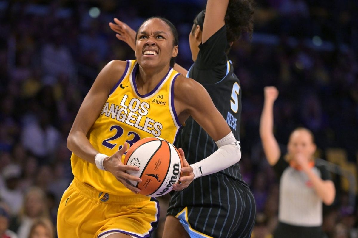 Jun 29, 2025; Los Angeles, California, USA; Los Angeles Sparks forward Azura Stevens (23) drives past Chicago Sky forward Angel Reese (5) in the first half at Crypto.com Arena. Mandatory Credit: Jayne Kamin-Oncea-Imagn Images
