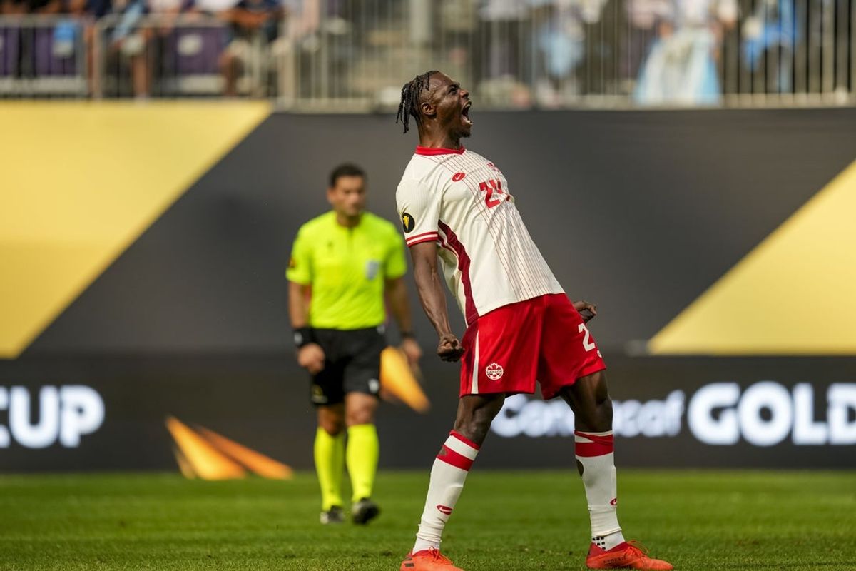 Jun 29, 2025; Minneapolis, Minnesota, USA; Canada forward Promise David (24) makes a penalty kick during a quarterfinal match of the 2025 Gold Cup at U.S. Bank Stadium. Mandatory Credit: Brace Hemmelgarn-Imagn Images