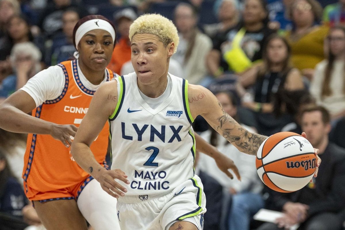 Jun 29, 2025; Minneapolis, Minnesota, USA; Minnesota Lynx guard Natisha Hiedeman (2) drives to the basket against the Connecticut Sun in the first half at Target Center. Mandatory Credit: Jesse Johnson-Imagn Images