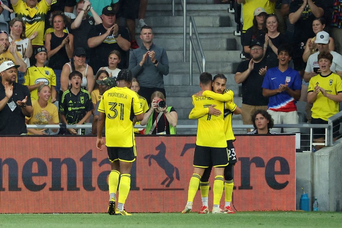 Jun 29, 2025; Columbus, Ohio, USA; Columbus Crew defender Mohamed Farsi (23) celebrates his goal with midfielder Dylan Chambost (7) during the first half against the Philadelphia Union at Lower.com Field. Mandatory Credit: Joseph Maiorana-Imagn Images