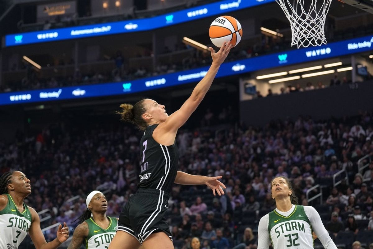 Jun 29, 2025; San Francisco, California, USA; Golden State Valkyries forward Stephanie Talbot (7) shoots against Seattle Storm forwards Nneka Ogwumike (3) and Alysha Clark (32) during the first quarter at Chase Center. Mandatory Credit: Darren Yamashita-Imagn Images