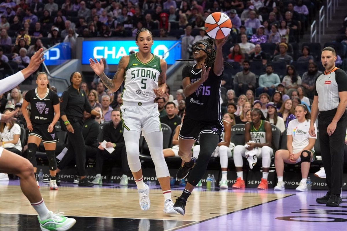 Jun 29, 2025; San Francisco, California, USA; Golden State Valkyries guard Tiffany Hayes (15) passes against Seattle Storm forward Gabby Williams (5) during the first quarter at Chase Center. Mandatory Credit: Darren Yamashita-Imagn Images
