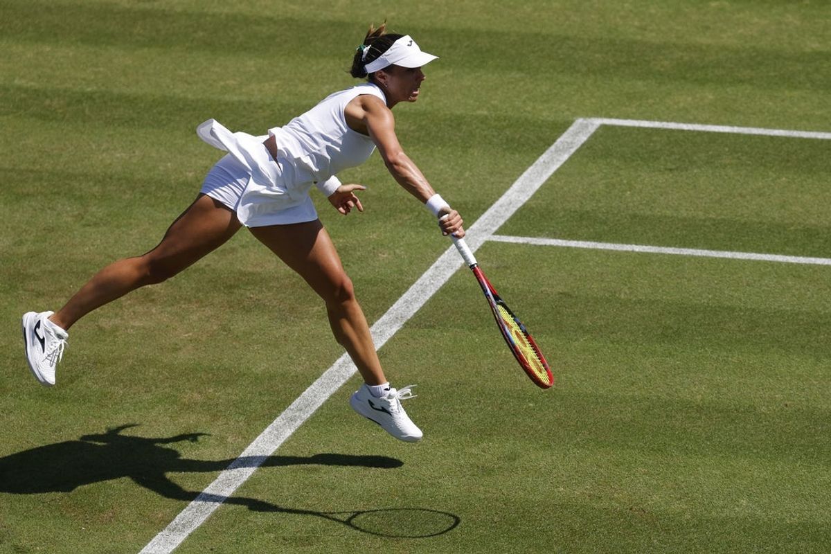 Jun 30, 2025; Wimbledon, United Kingdom; Viktoriya Tomova (BUL) serves against Ons Jabeur (TUN)(not pictured) on day one of The Championships, Wimbledon 2025 at All England Lawn Tennis and Croquet Club. Mandatory Credit: Geoff Burke-Imagn Images