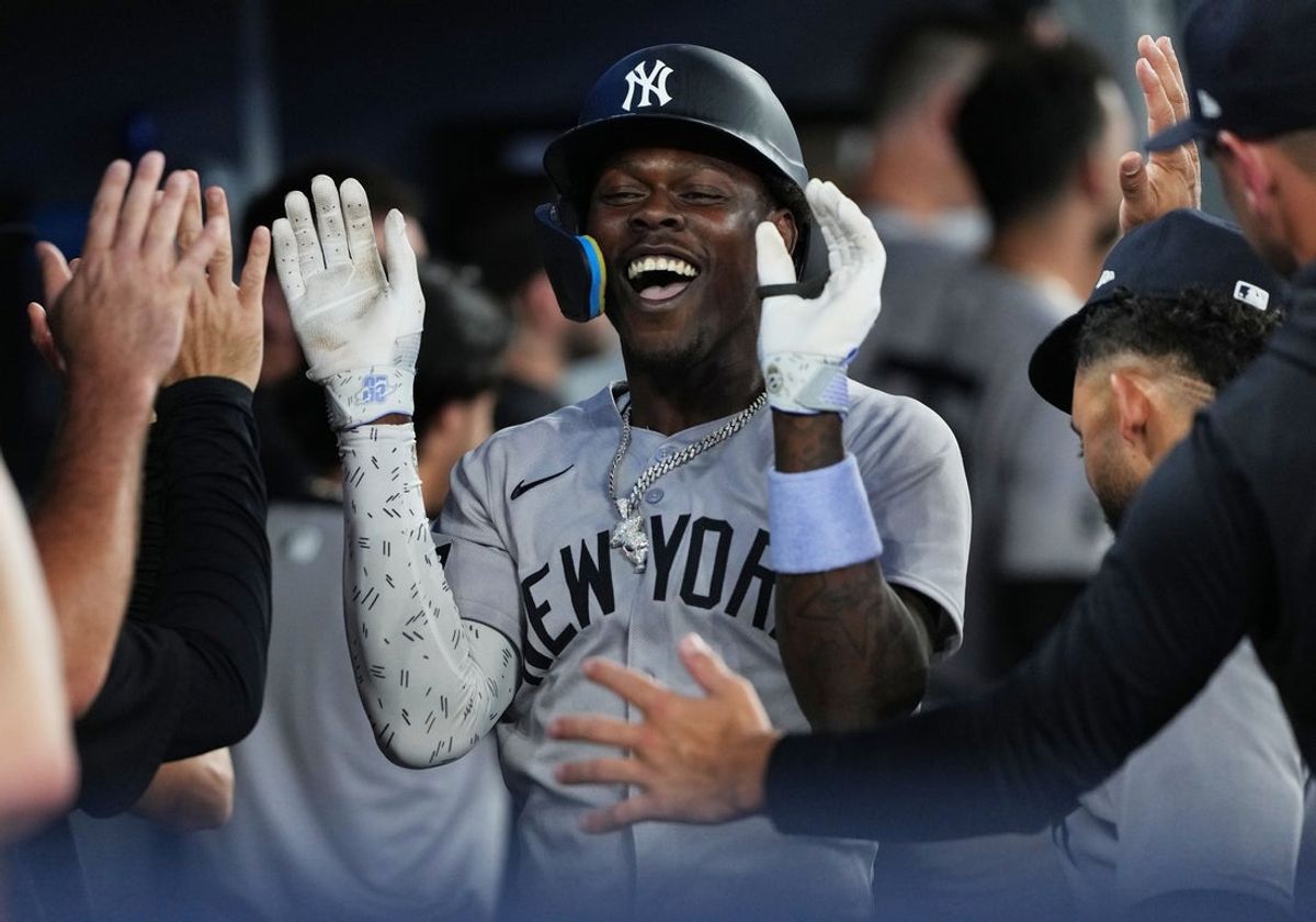 Jun 30, 2025; Toronto, Ontario, CAN; New York Yankees third baseman Jazz Chisholm Jr. (13) celebrates in the dugout after hitting a two-run home run against the Toronto Blue Jays during the fourth inning at Rogers Centre. Mandatory Credit: Nick Turchiaro-Imagn Images