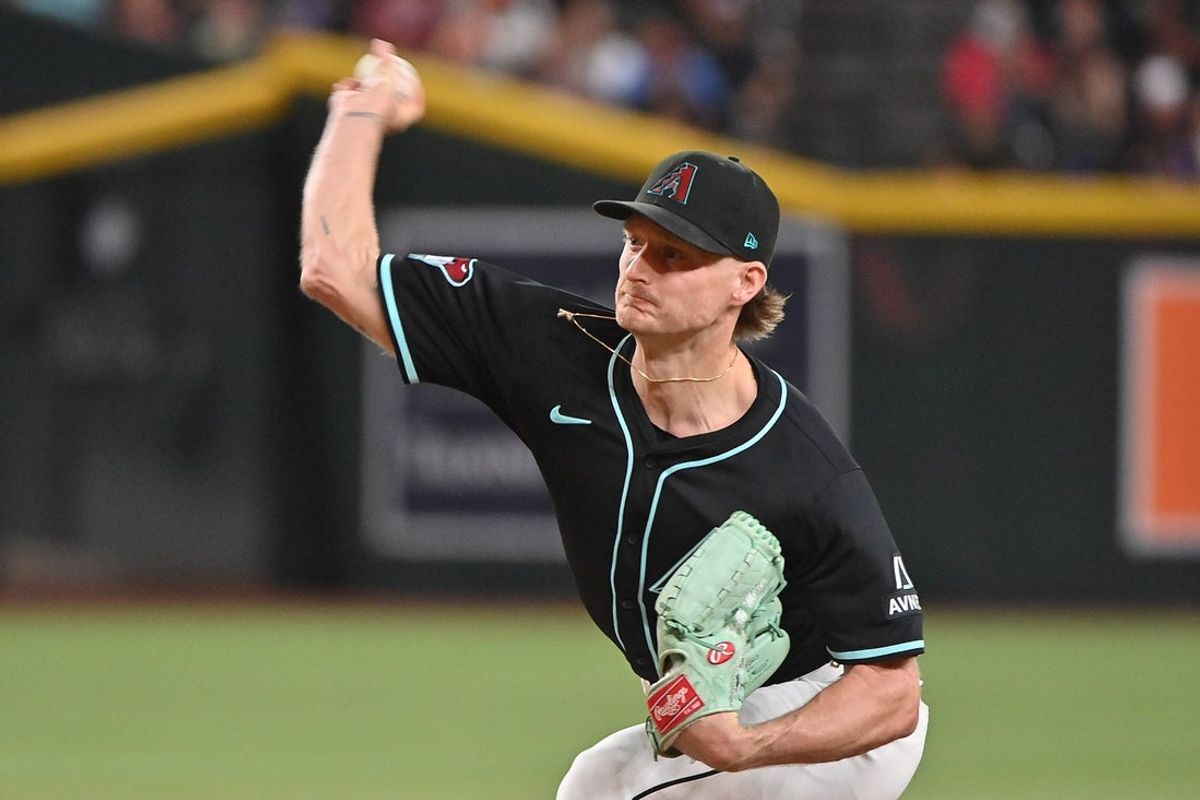 Jun 30, 2025; Phoenix, Arizona, USA;  Arizona Diamondbacks pitcher Shelby Miller (18) throws in the ninth inning against the San Francisco Giants at Chase Field. Mandatory Credit: Matt Kartozian-Imagn Images