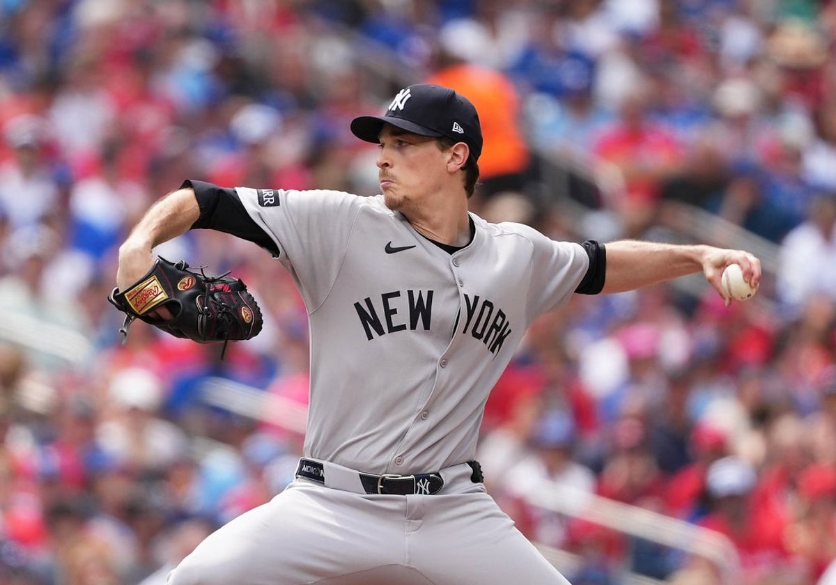 Jul 1, 2025; Toronto, Ontario, CAN; New York Yankees starting pitcher Max Fried (54) throws a pitch against the Toronto Blue Jays during the first inning at Rogers Centre. Mandatory Credit: Nick Turchiaro-Imagn Images