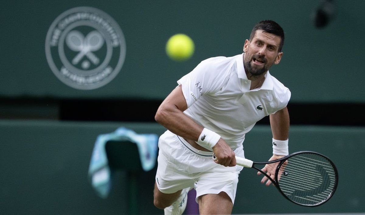 Jul 1, 2025; Wimbledon, UNITED KINGDOM; Novak Djokovic of Serbia serves the ball during his match against Alexandre Muller of France on day two at the All England Lawn Tennis and Croquet Club. Mandatory Credit: Susan Mullane-Imagn Images