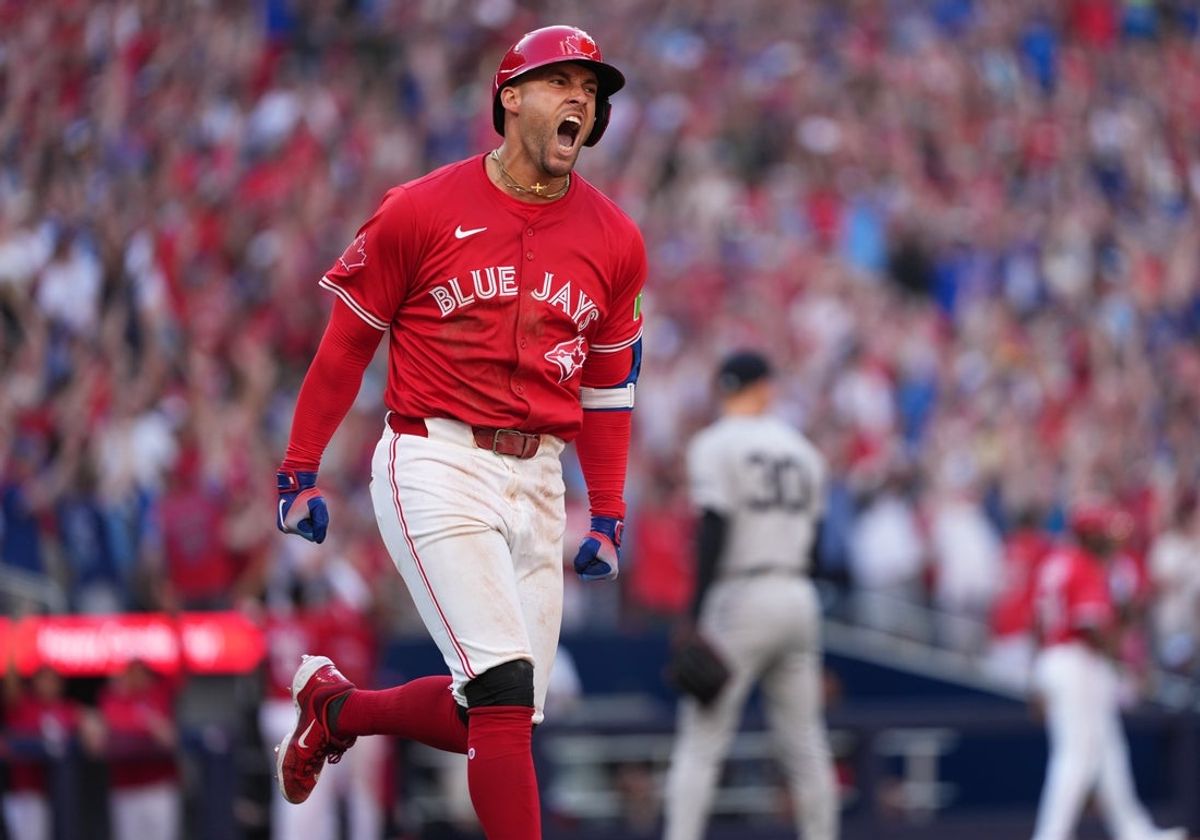 Jul 1, 2025; Toronto, Ontario, CAN;  Toronto Blue Jays right fielder George Springer (4) reacts after hitting a grand slam hone run against the New York Yankees during the seventh inning at Rogers Centre. Mandatory Credit: Nick Turchiaro-Imagn Images