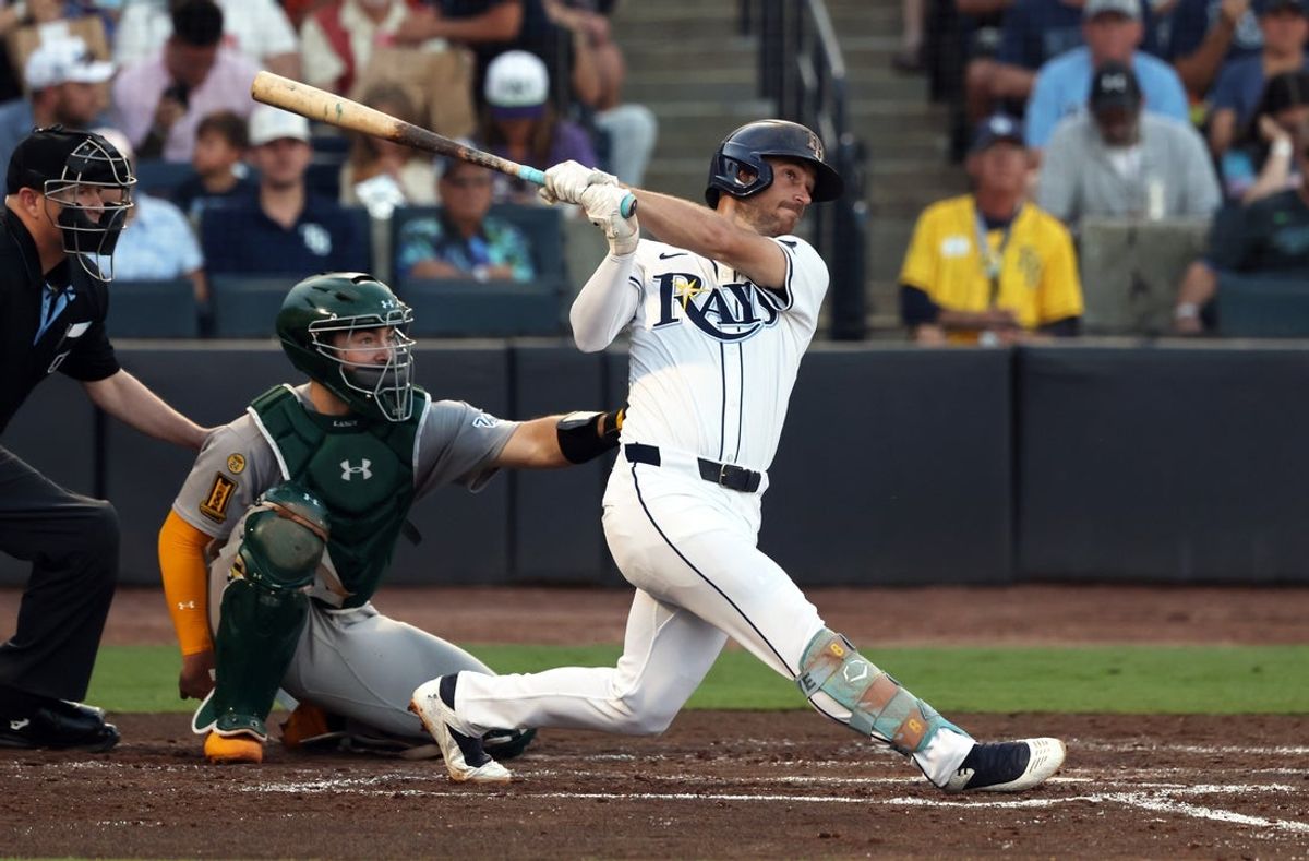 Jul 1, 2025; St. Petersburg, Florida, USA; Tampa Bay Rays second base Brandon Lowe (8) hits a home run against the Athletics during the third inning at George M. Steinbrenner Field. Mandatory Credit: Kim Klement Neitzel-Imagn Images