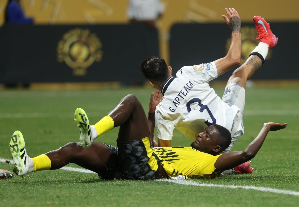Jul 1, 2025; Atlanta, Georgia, USA; Borussia Dortmund forward Serhou Guirassy (9) slides against CF Monterrey defender Gerardo Arteaga (3) in the first half during a round of 16 match of the 2025 FIFA Club World Cup at Mercedes-Benz Stadium. Mandatory Credit: Brett Davis-Imagn Images