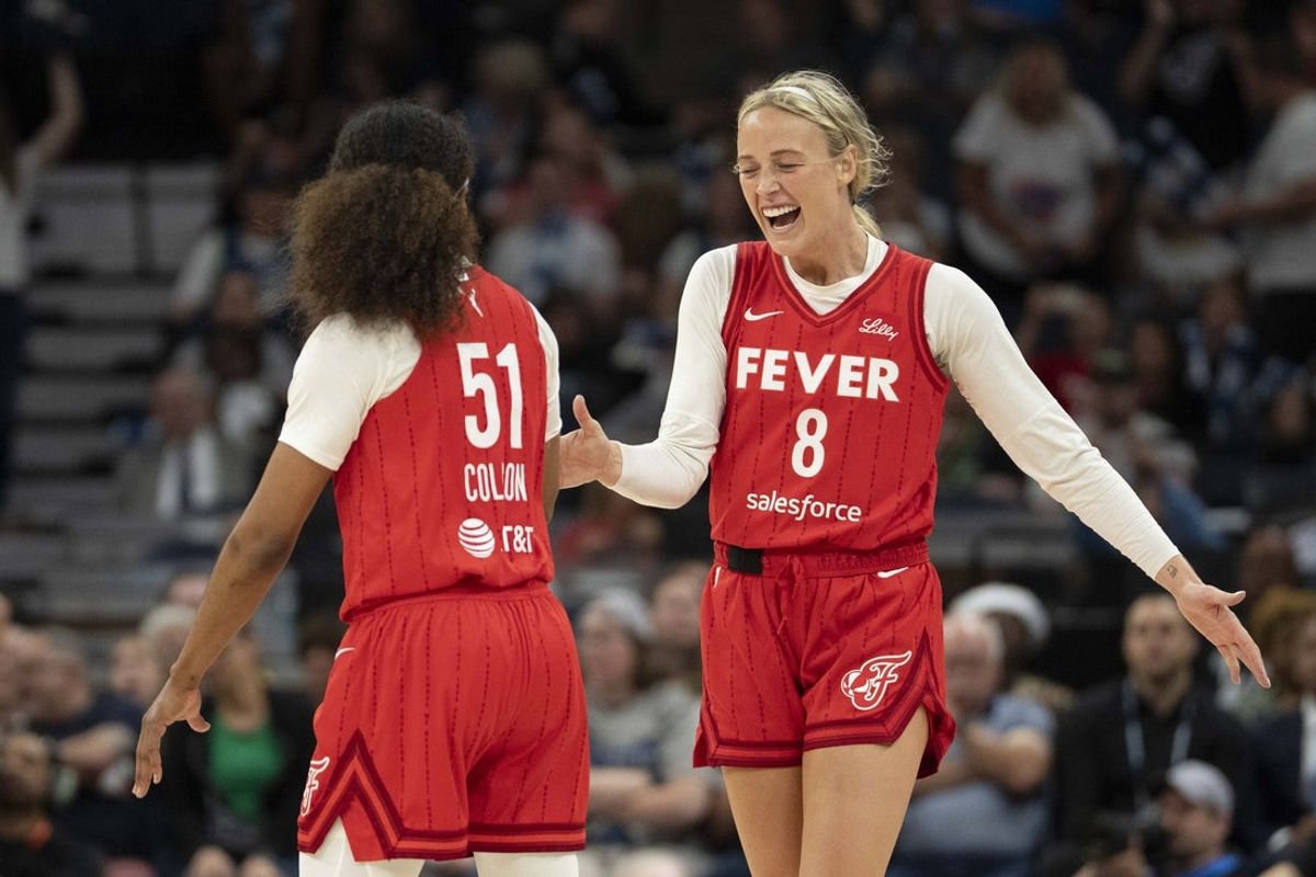 Jul 1, 2025; Minneapolis, Minnesota, USA; Indiana Fever guard Sophie Cunningham (8) celebrates with Indiana Fever guard Sydney Colson (51) after defeating the Minnesota Lynx during the Commissioner's Cup final at Target Center. Mandatory Credit: Jesse Johnson-Imagn Images