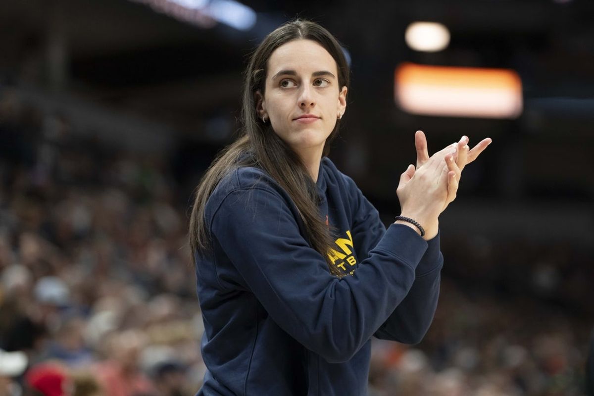 Jul 1, 2025; Minneapolis, Minnesota, USA; Indiana Fever guard Caitlin Clark (22) looks on against the Minnesota Lynx in the second half during the Commissioner's Cup final at Target Center. Mandatory Credit: Jesse Johnson-Imagn Images