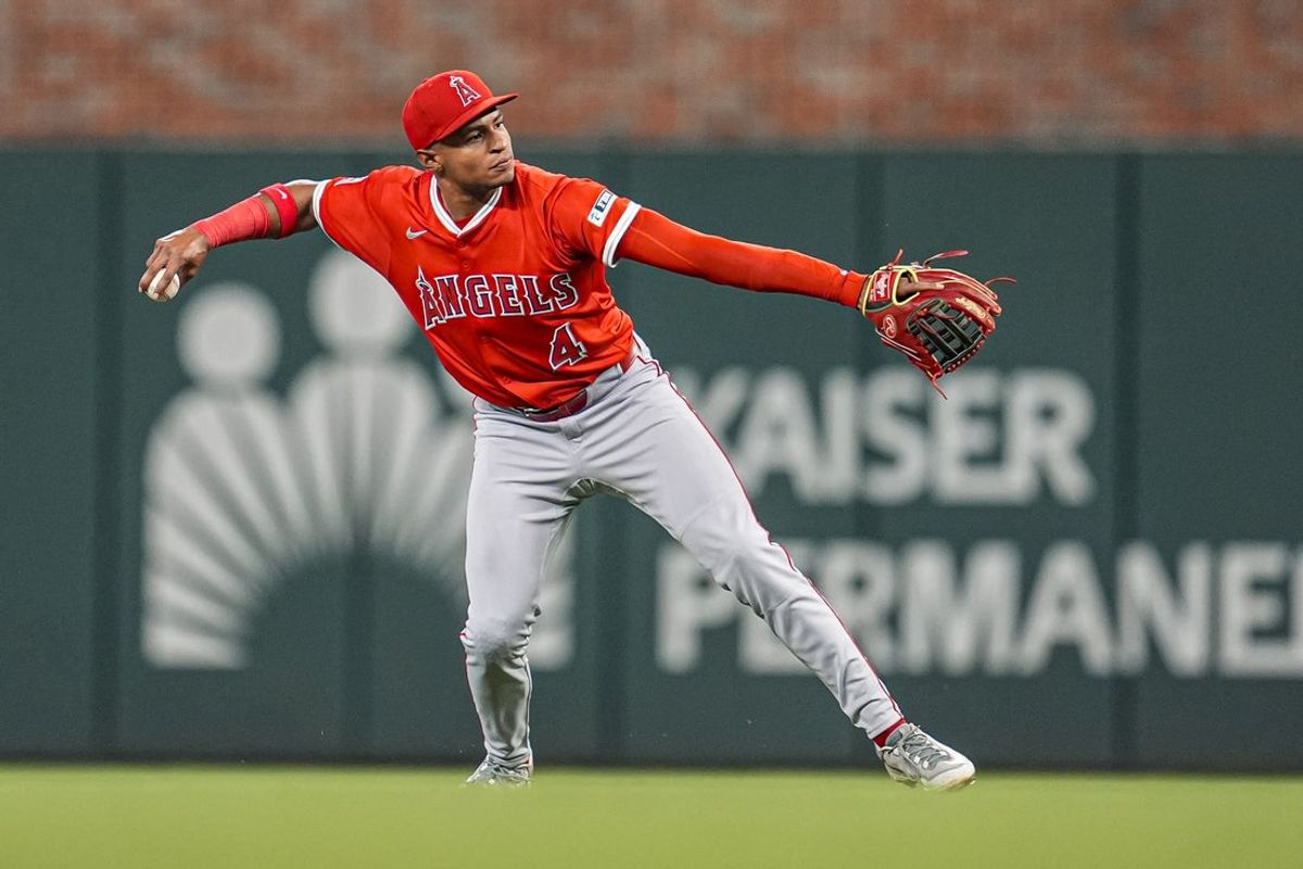 Jul 1, 2025; Cumberland, Georgia, USA; Los Angeles Angels second baseman Christian Moore (4) throws out Atlanta Braves designated hitter Marcell Ozuna (20) (not shown) during the eighth inning at Truist Park. Mandatory Credit: Dale Zanine-Imagn Images
