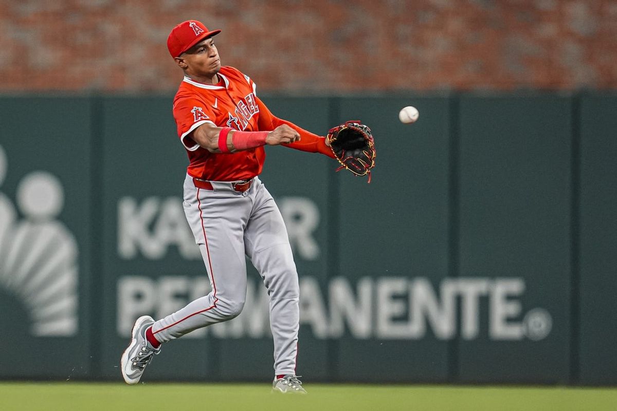 Jul 1, 2025; Cumberland, Georgia, USA; Los Angeles Angels second baseman Christian Moore (4) throws out Atlanta Braves designated hitter Marcell Ozuna (20) (not shown) during the eighth inning at Truist Park. Mandatory Credit: Dale Zanine-Imagn Images
