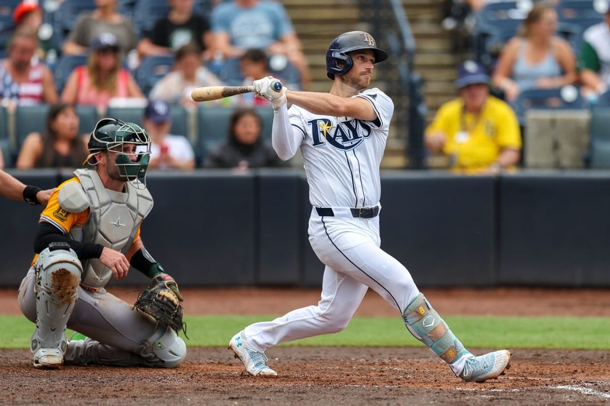 Jul 2, 2025; Tampa, Florida, USA; Tampa Bay Rays second baseman Brandon Lowe (8) doubles against the Oakland Athletics in the sixth inning at George M. Steinbrenner Field. Mandatory Credit: Nathan Ray Seebeck-Imagn Images