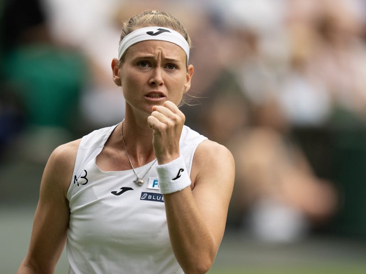 Jul 2, 2025; Wimbledon, United Kingdom; Marie Bouzkova of the Czech Republic reacts to a point during her match against Aryna Sabalenka on day three at the All England Lawn Tennis and Croquet Club. Mandatory Credit: Susan Mullane-Imagn Images