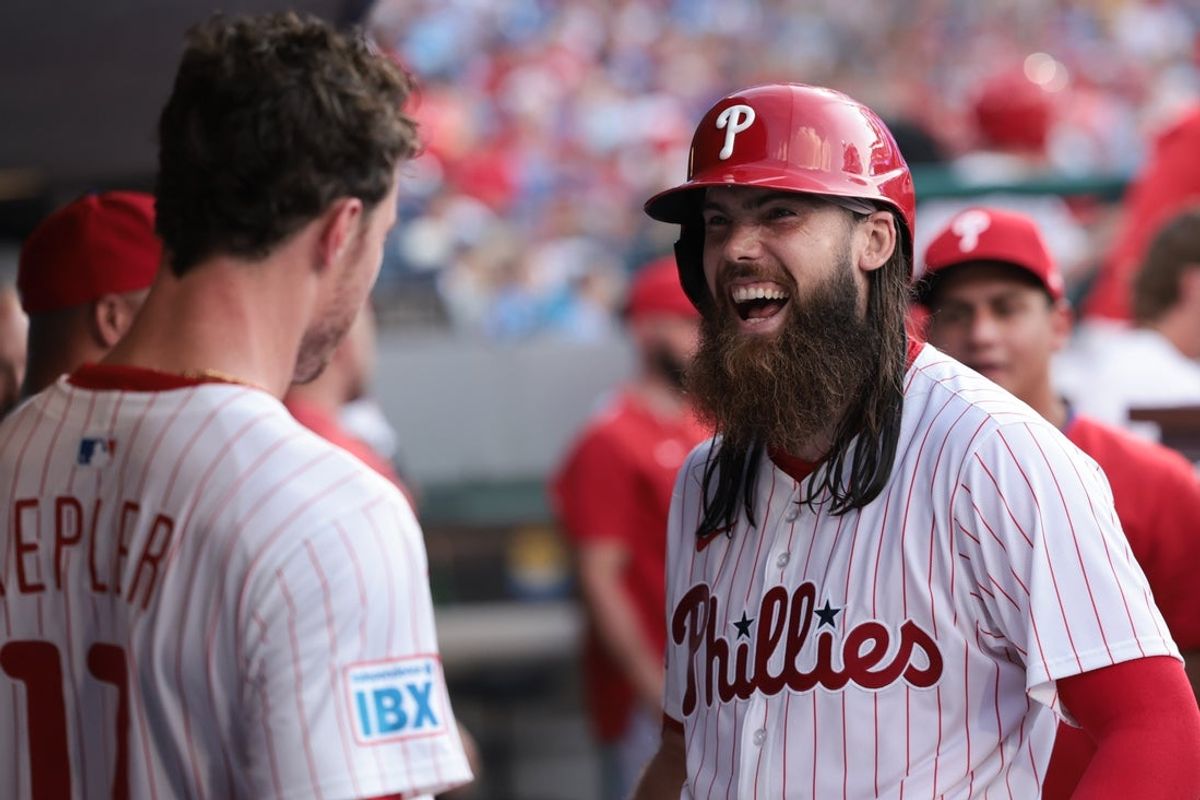 Jul 2, 2025; Philadelphia, Pennsylvania, USA; Philadelphia Phillies outfielder Brandon Marsh (16) celebrates with outfielder Max Kepler (17) after hitting a home run against the San Diego Padres during the fifth inning at Citizens Bank Park. Mandatory Credit: Bill Streicher-Imagn Images