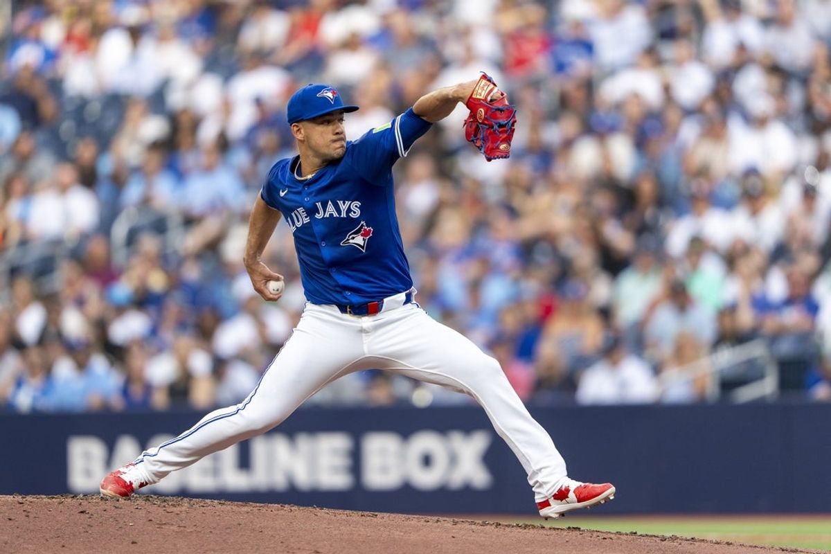 Jul 2, 2025; Toronto, Ontario, CAN; Toronto Blue Jays pitcher Jose Berrios (17) pitches to the New York Yankees during the first inning at Rogers Centre. Mandatory Credit: Kevin Sousa-Imagn Images