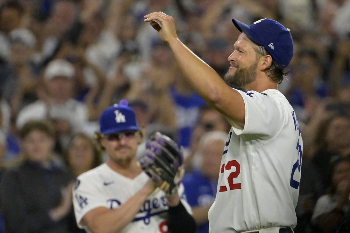 Jul 2, 2025; Los Angeles, California, USA;  Los Angeles Dodgers starting pitcher Clayton Kershaw (22) acknowledges the crowd after striking out Chicago White Sox third baseman Vinny Capra (41) for his 3000th career strike at Dodger Stadium. Mandatory Credit: Jayne Kamin-Oncea-Imagn Images