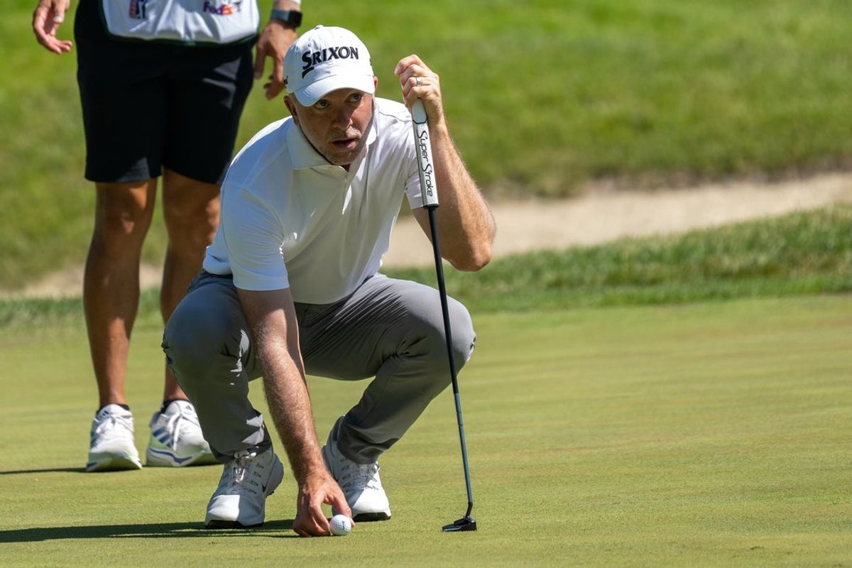 Jul 3, 2025; Silvis, Illinois, USA; Martin Laird lines up his putt on the 9th hole during the first round of the John Deere Classic golf tournament. Mandatory Credit: Marc Lebryk-Imagn Images