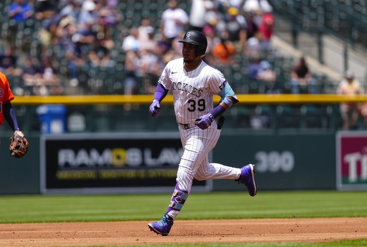 Jul 3, 2025; Denver, Colorado, USA; Colorado Rockies second baseman Thairo Estrada (39) runs off a two run home run in the first inning against the Houston Astros at Coors Field. Mandatory Credit: Ron Chenoy-Imagn Images