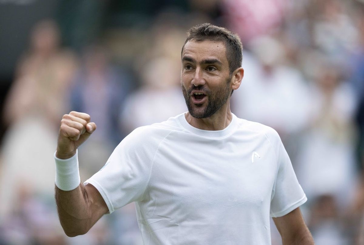 Jul 3, 2025; Wimbledon, United Kingdom; Marin Cilic of Croatia celebrates winning his match against Jack Draper of Great Britain on day four at the All England Lawn Tennis and Croquet Club. Mandatory Credit: Susan Mullane-Imagn Images