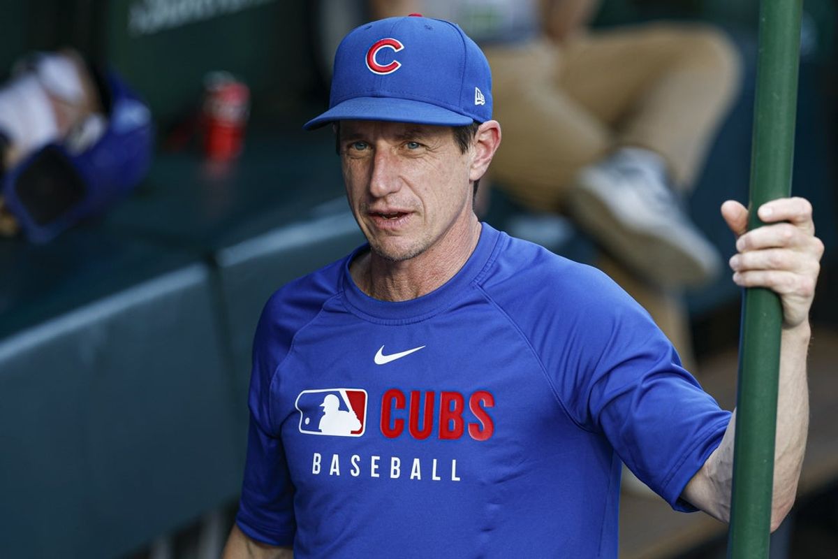 Jul 3, 2025; Chicago, Illinois, USA; Chicago Cubs manager Craig Counsell (11) stands in the dugout before a baseball game against the Cleveland Guardians at Wrigley Field. Mandatory Credit: Kamil Krzaczynski-Imagn Images