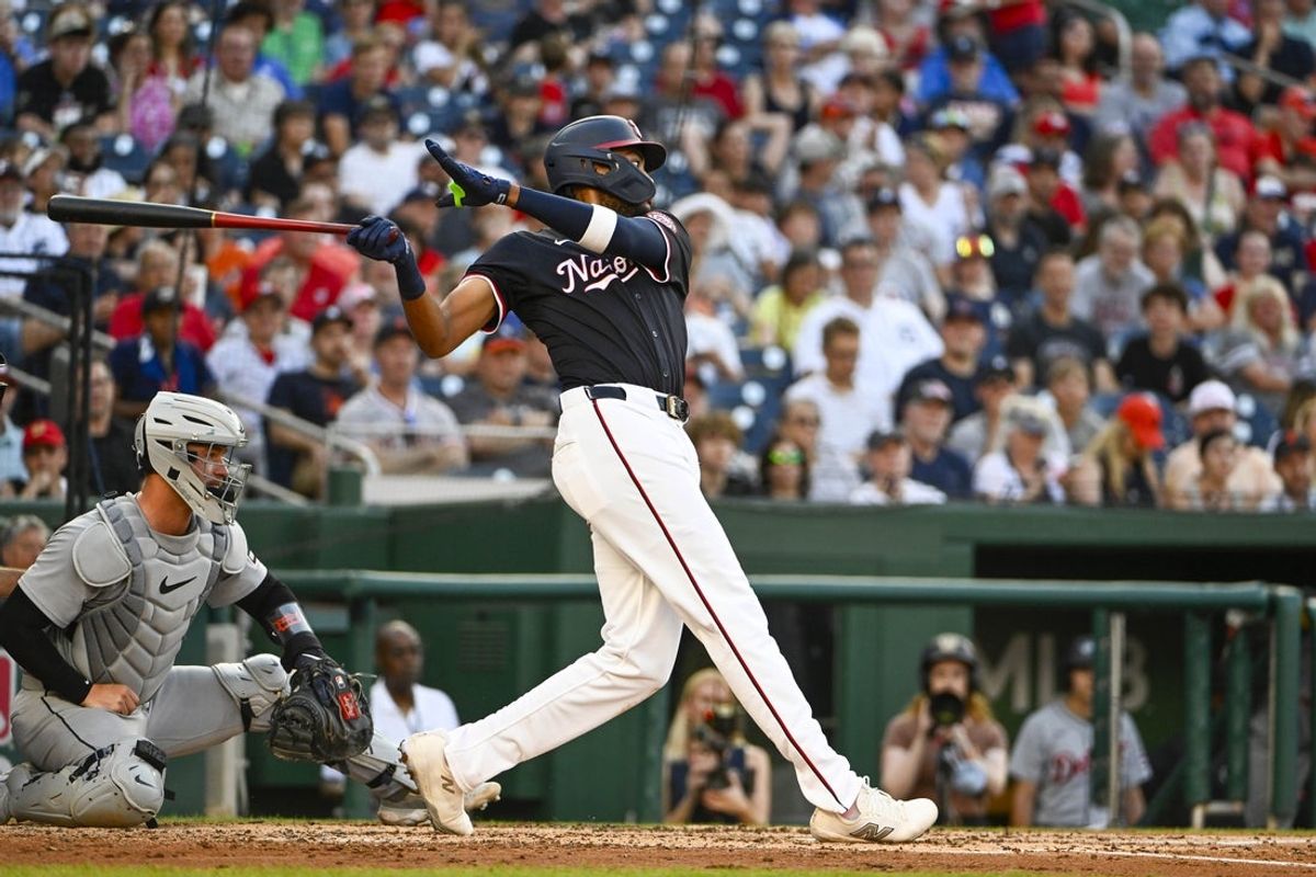 Jul 3, 2025; Washington, District of Columbia, USA; Washington Nationals left fielder James Wood (29) hits a solo home run against the Detroit Tigers during the second inning at Nationals Park. Mandatory Credit: Brad Mills-Imagn Images