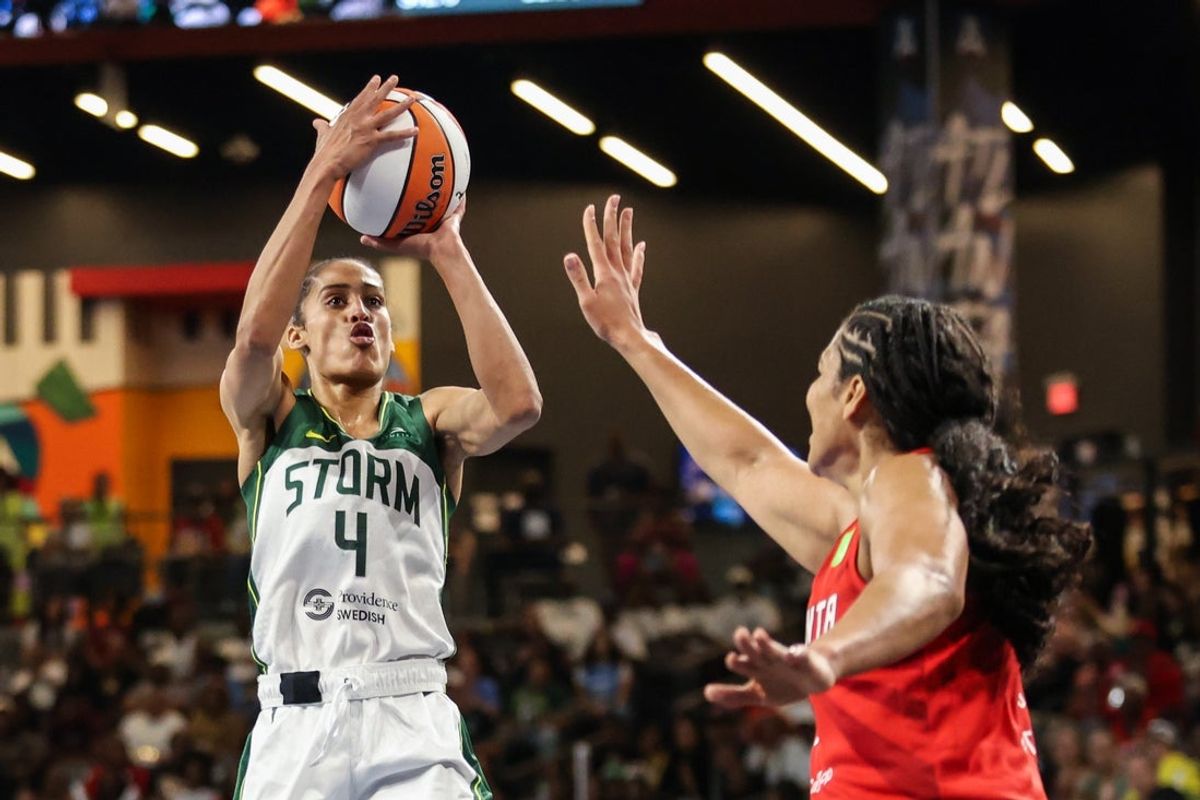 Jul 3, 2025; College Park, Georgia, USA; Seattle Storm guard Skylar Diggins (4) shoots the ball against Atlanta Dream forward Brionna Jones (24) during the first quarter at Gateway Center Arena at College Park. Mandatory Credit: Jordan Godfree-Imagn Images