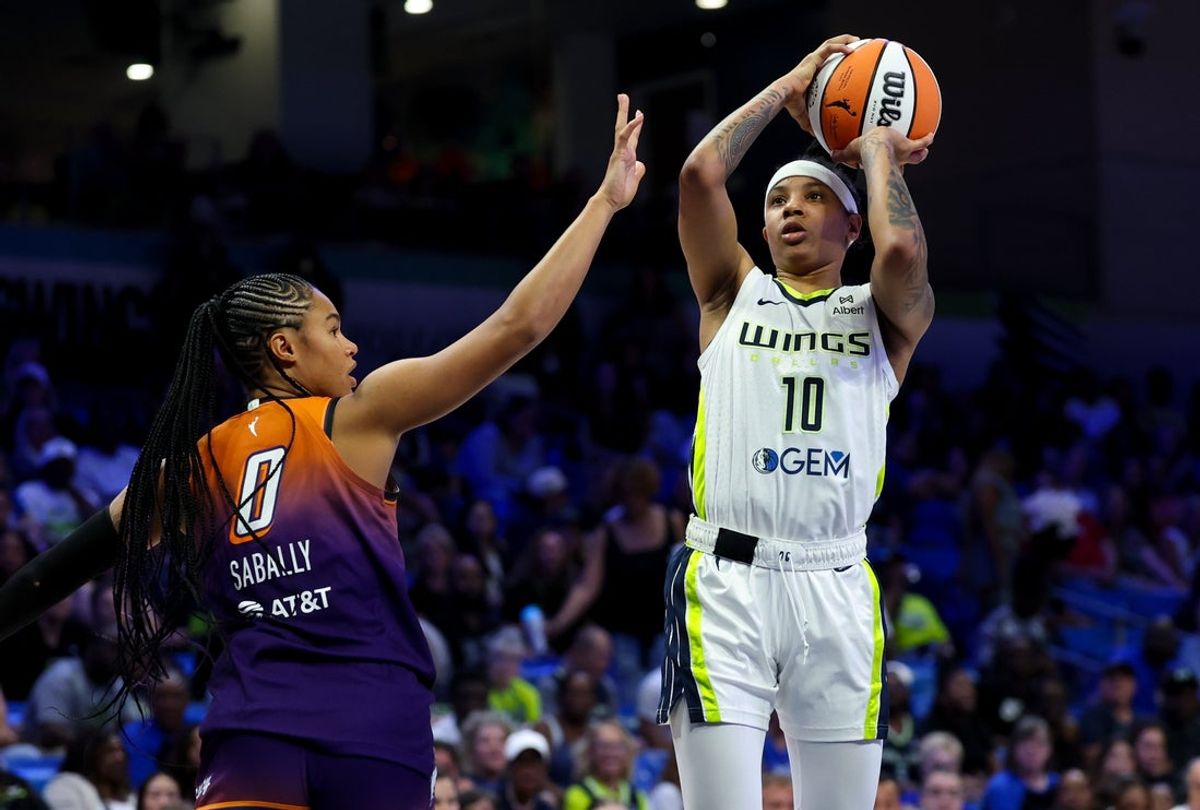 Jul 3, 2025; Arlington, Texas, USA; Dallas Wings guard Aziaha James (10) shoots over Phoenix Mercury forward Satou Sabally (0) during the first half at College Park Center. Mandatory Credit: Kevin Jairaj-Imagn Images