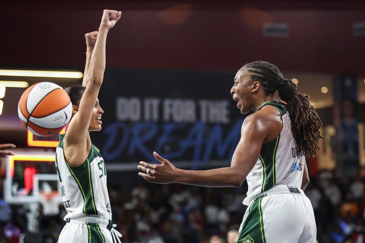 Jul 3, 2025; College Park, Georgia, USA; Seattle Storm guard Skylar Diggins (4) and forward Nneka Ogwumike (3) celebrate victory against the Atlanta Dream during the fourth quarter at Gateway Center Arena at College Park. Mandatory Credit: Jordan Godfree-Imagn Images