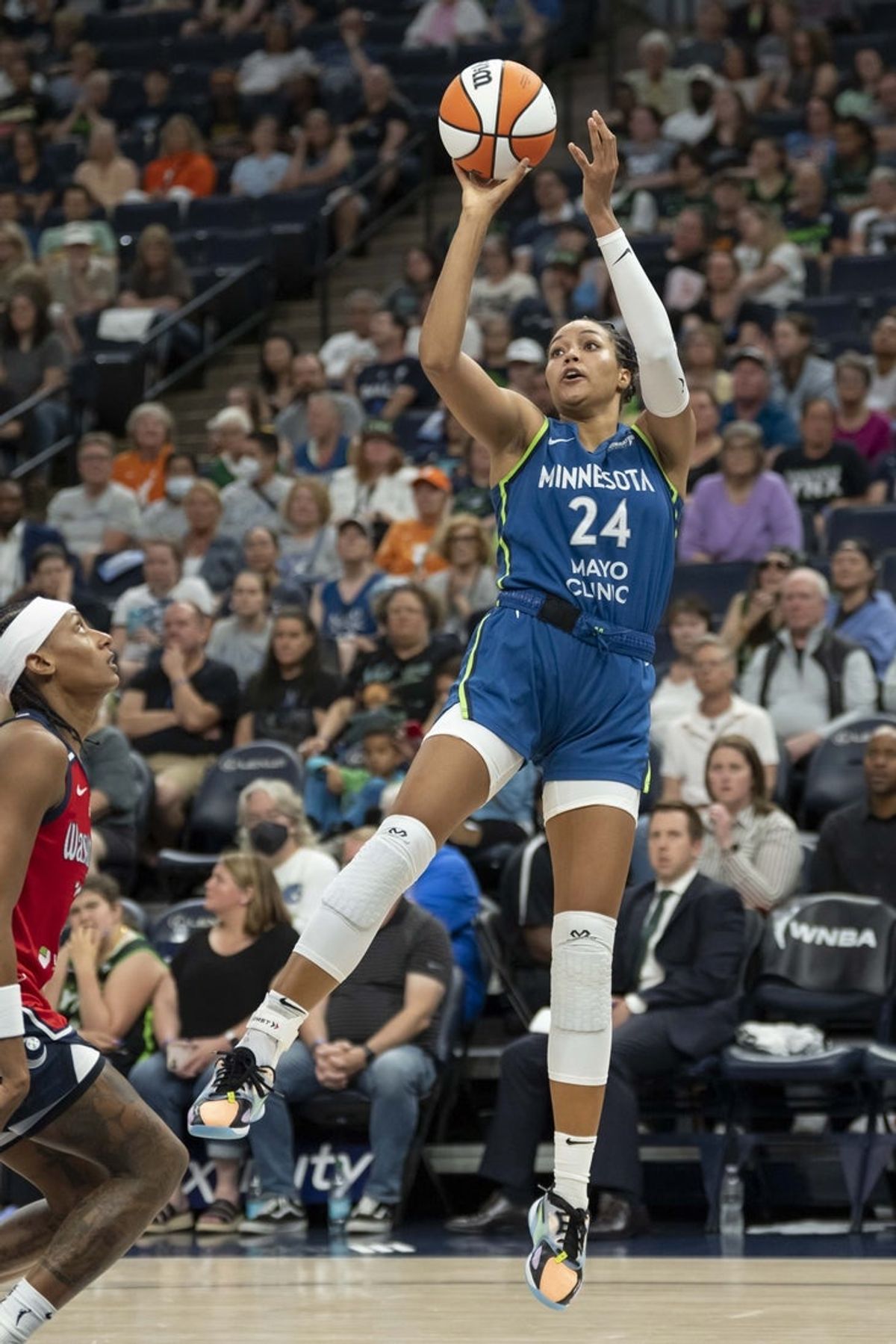 Jul 3, 2025; Minneapolis, Minnesota, USA; Minnesota Lynx forward Napheesa Collier (24) shoots the ball against the Washington Mystics in the second half at Target Center. Mandatory Credit: Jesse Johnson-Imagn Images