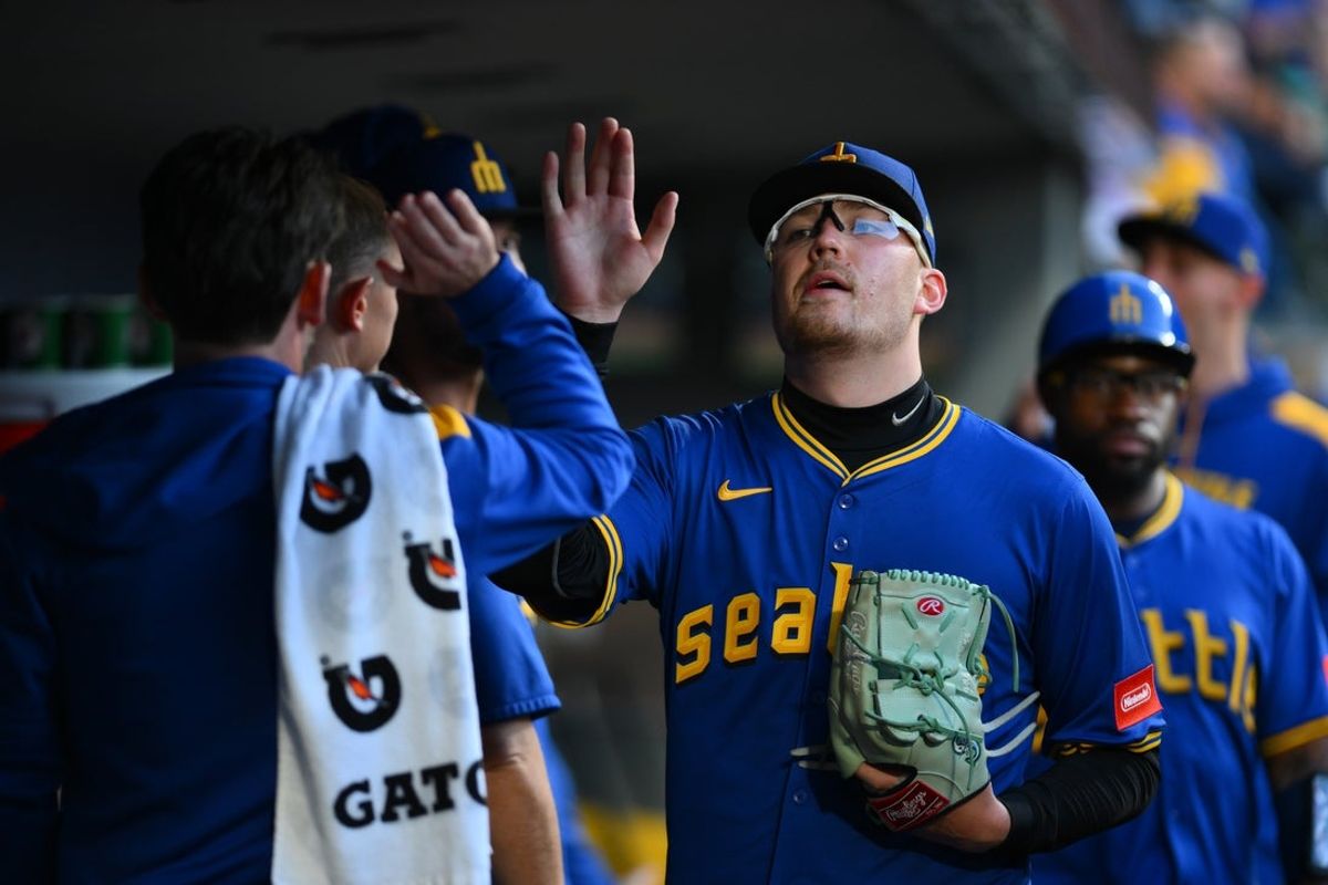 Jul 3, 2025; Seattle, Washington, USA; Seattle Mariners starting pitcher Logan Evans (73) in the dugout after being pulled from the game during the sixth inning against the Kansas City Royals at T-Mobile Park. Mandatory Credit: Steven Bisig-Imagn Images