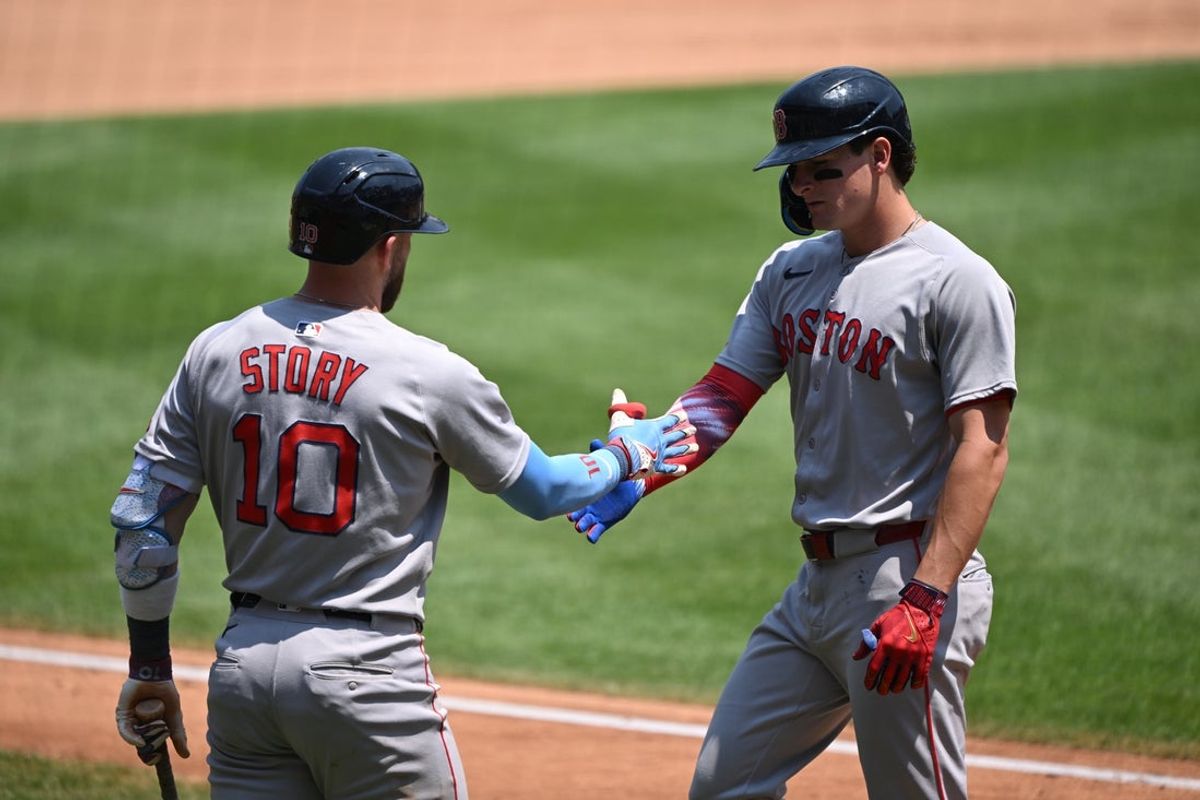 Jul 4, 2025; Washington, District of Columbia, USA; Boston Red Sox right fielder Roman Anthony (19) celebrates with shortstop Trevor Story (10) after scoring a run against the Washington Nationals during the fifth inning at Nationals Park. Mandatory Credit: Rafael Suanes-Imagn Images
