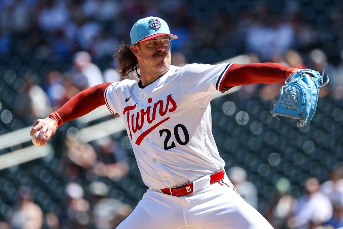 Jul 4, 2025; Minneapolis, Minnesota, USA; Minnesota Twins starting pitcher Chris Paddack (20) delivers a pitch against the Tampa Bay Rays during the first inning at Target Field. Mandatory Credit: Matt Krohn-Imagn Images