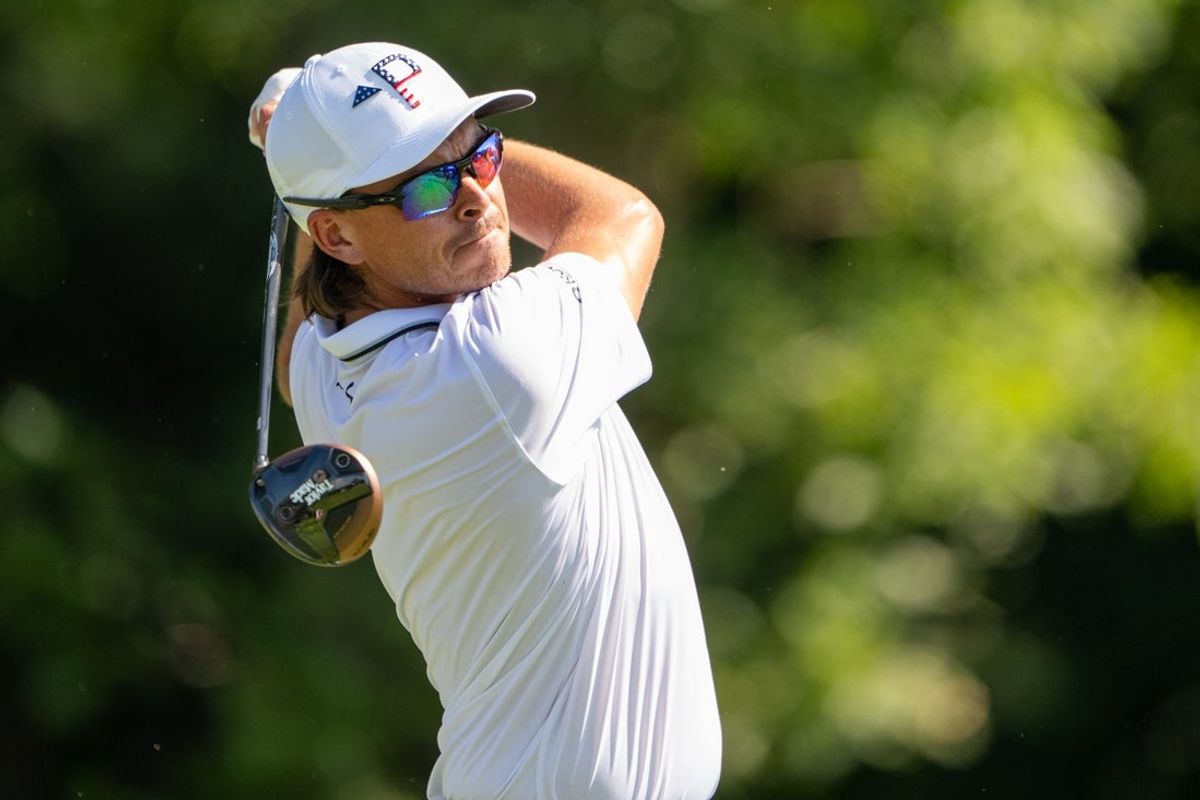 Jul 4, 2025; Silvis, Illinois, USA; Rickie Fowler tees off on the 13th hole during the second round of the John Deere Classic golf tournament. Mandatory Credit: Marc Lebryk-Imagn Images