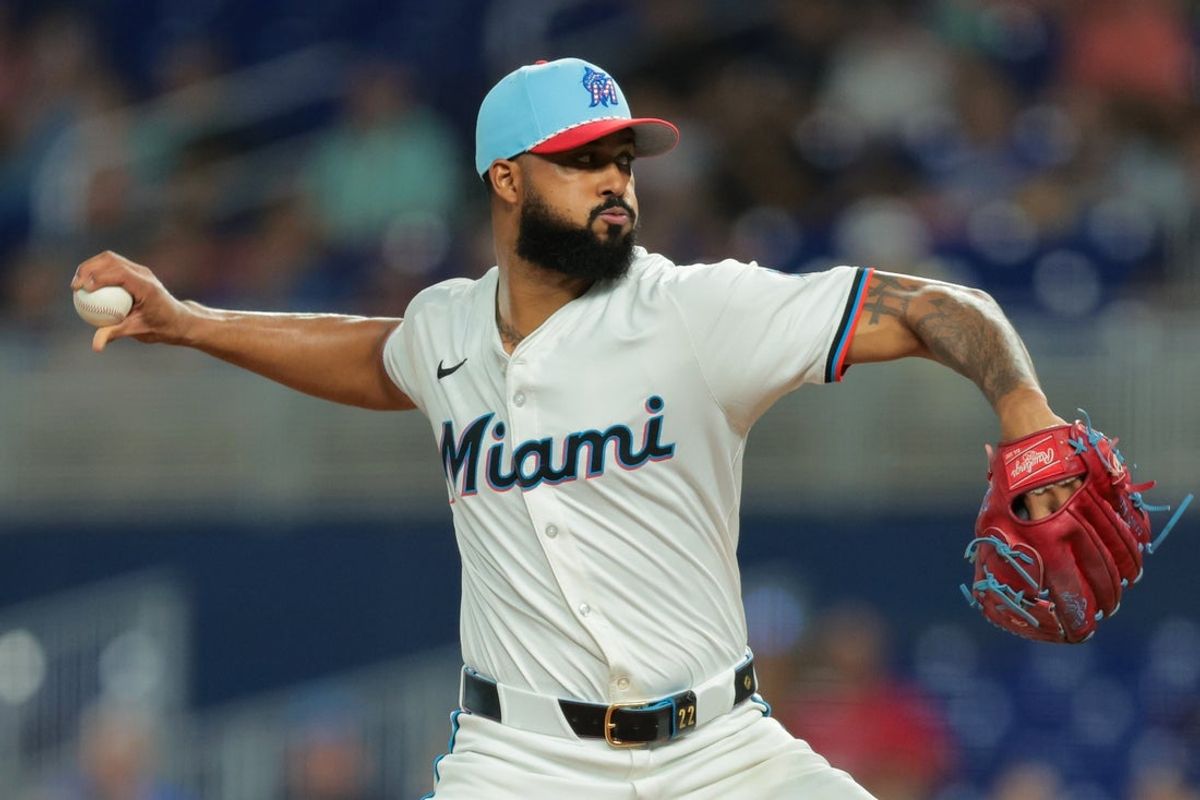 Jul 4, 2025; Miami, Florida, USA; Miami Marlins starting pitcher Sandy Alcantara (22) delivers a pitch against the Milwaukee Brewers during the first inning at loanDepot Park. Mandatory Credit: Sam Navarro-Imagn Images