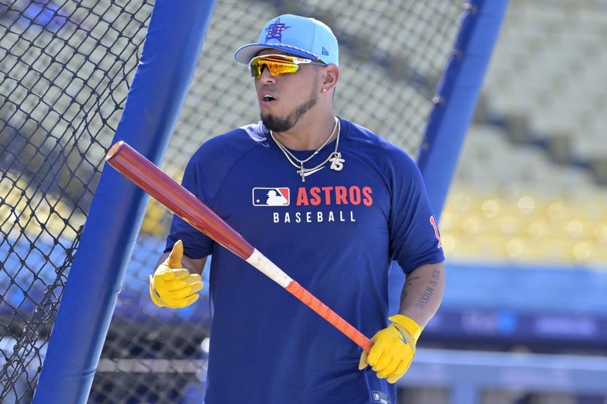 Jul 4, 2025; Los Angeles, California, USA;  Houston Astros third baseman Isaac Paredes (15) warms up prior to the game against the Los Angeles Dodgers at Dodger Stadium. Mandatory Credit: Jayne Kamin-Oncea-Imagn Images