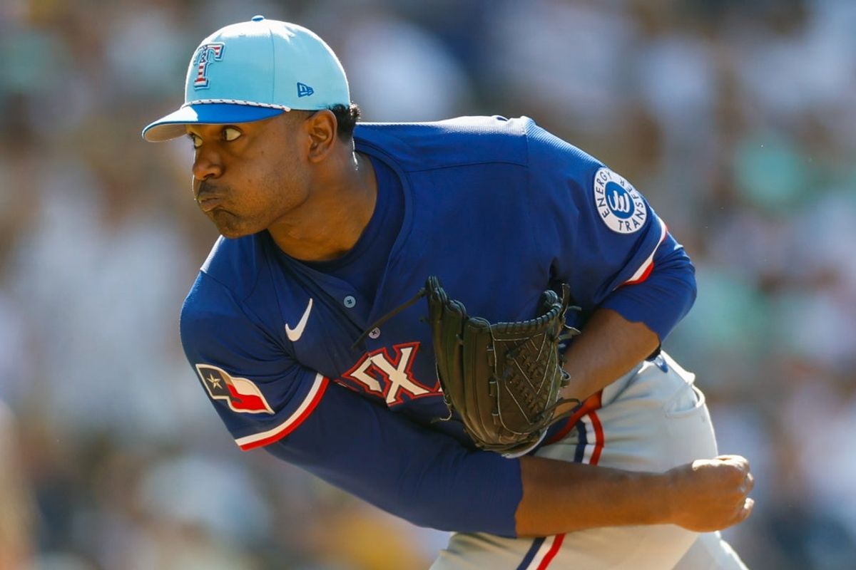 Jul 4, 2025; San Diego, California, USA; Texas Rangers starting pitcher Kumar Rocker (80) throws a pitch during the fifth inning against the San Diego Padres at Petco Park. Mandatory Credit: David Frerker-Imagn Images