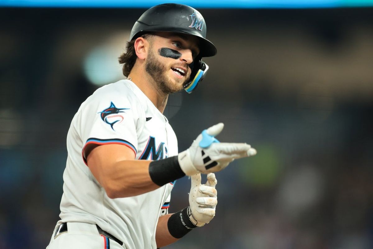Jul 4, 2025; Miami, Florida, USA; Miami Marlins third baseman Connor Norby (1) reacts toward the dugout after hitting a solo home run against the Milwaukee Brewers during the fourth inning at loanDepot Park. Mandatory Credit: Sam Navarro-Imagn Images