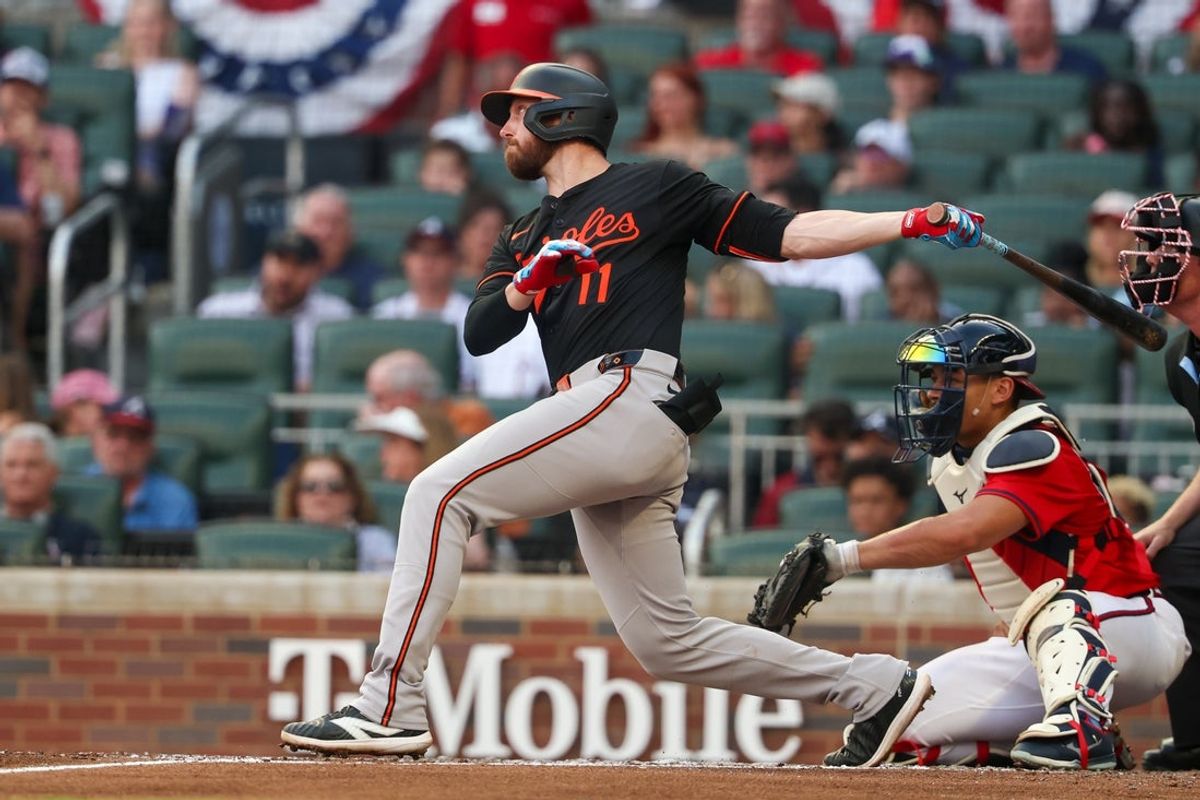 Jul 4, 2025; Atlanta, Georgia, USA; Baltimore Orioles third baseman Jordan Westburg (11) hits a home run against the Atlanta Braves in the third inning at Truist Park. Mandatory Credit: Brett Davis-Imagn Images