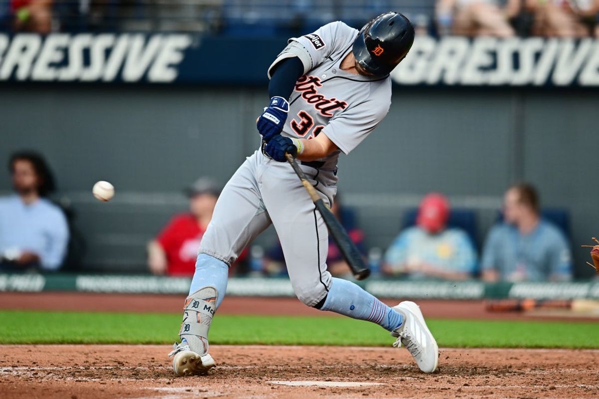 Jul 4, 2025; Cleveland, Ohio, USA; Detroit Tigers shortstop Zach McKinstry (39) hits a home run during the fourth inning against the Cleveland Guardians at Progressive Field. Mandatory Credit: Ken Blaze-Imagn Images