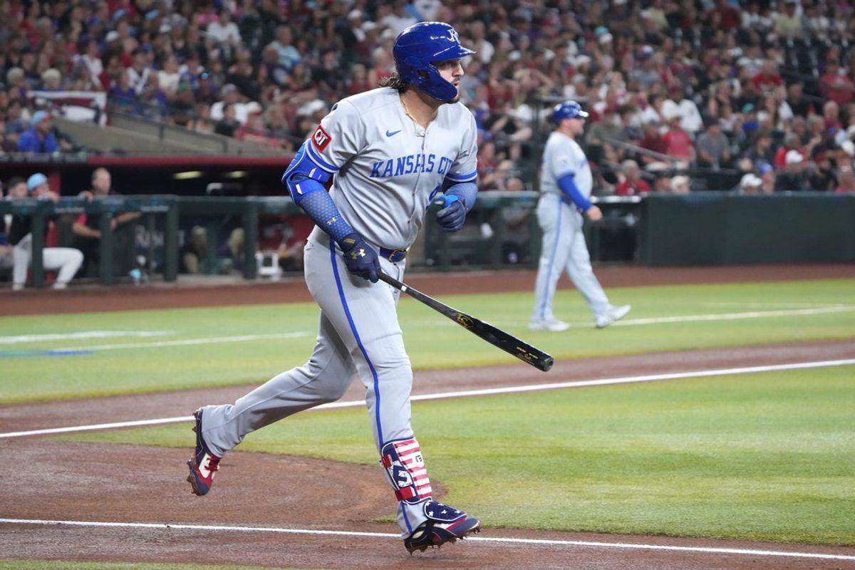 Jul 4, 2025; Phoenix, Arizona, USA; Kansas City Royals first base Vinnie Pasquantino (9) hits a three run home run against the Arizona Diamondbacks during the first inning at Chase Field. Mandatory Credit: Joe Camporeale-Imagn Images