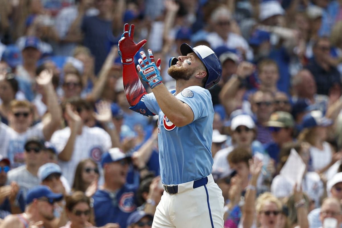 Jul 4, 2025; Chicago, Illinois, USA; Chicago Cubs first baseman Michael Busch (29) rounds the bases after hitting a solo home run against the St. Louis Cardinals during the seventh inning at Wrigley Field. Mandatory Credit: Kamil Krzaczynski-Imagn Images