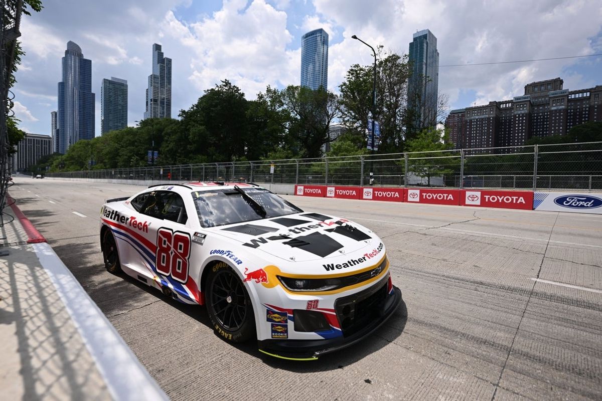Jul 5, 2025; Chicago, Illinois, USA; NASCAR Cup Series driver Shane Van Gisbergen (88) during qualifying for the Grant Park 165 at Chicago Street Race. Mandatory Credit: Daniel Bartel-Imagn Images