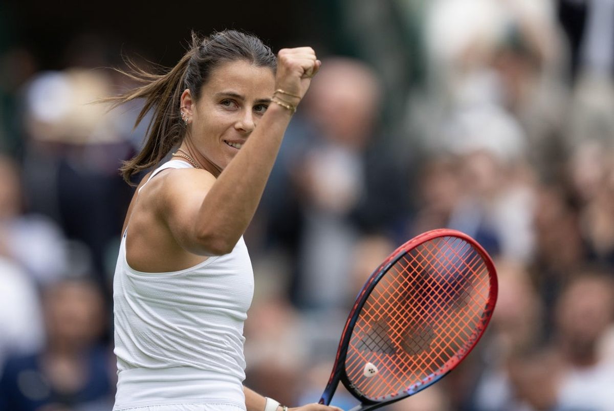 Jul 5, 2025; Wimbledon, United Kingdom;  Emma Navarro of the United States celebrates winning her match against Barbora Krejcikova of the Czech Republic on day six at the All England Lawn Tennis and Croquet Club. Mandatory Credit: Susan Mullane-Imagn Images