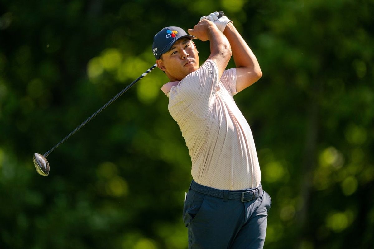 Jul 5, 2025; Silvis, Illinois, USA; Si Woo Kim tees off on the 2nd hole during the third round of the John Deere Classic golf tournament. Mandatory Credit: Marc Lebryk-Imagn Images