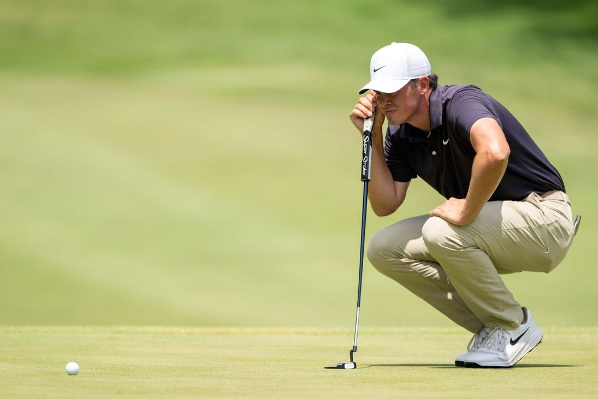 Jul 5, 2025; Silvis, Illinois, USA; Davis Thompson lineup his putt on the 9th hole during the third round of the John Deere Classic golf tournament. Mandatory Credit: Marc Lebryk-Imagn Images