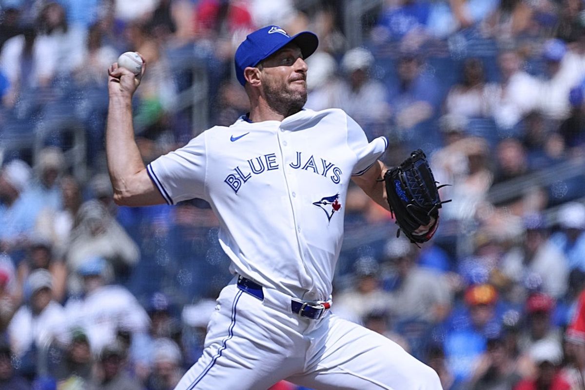 Jul 5, 2025; Toronto, Ontario, CAN; Toronto Blue Jays starting pitcher Max Scherzer (31) pitches to the Los Angeles Angels during the first inning at Rogers Centre. Mandatory Credit: John E. Sokolowski-Imagn Images